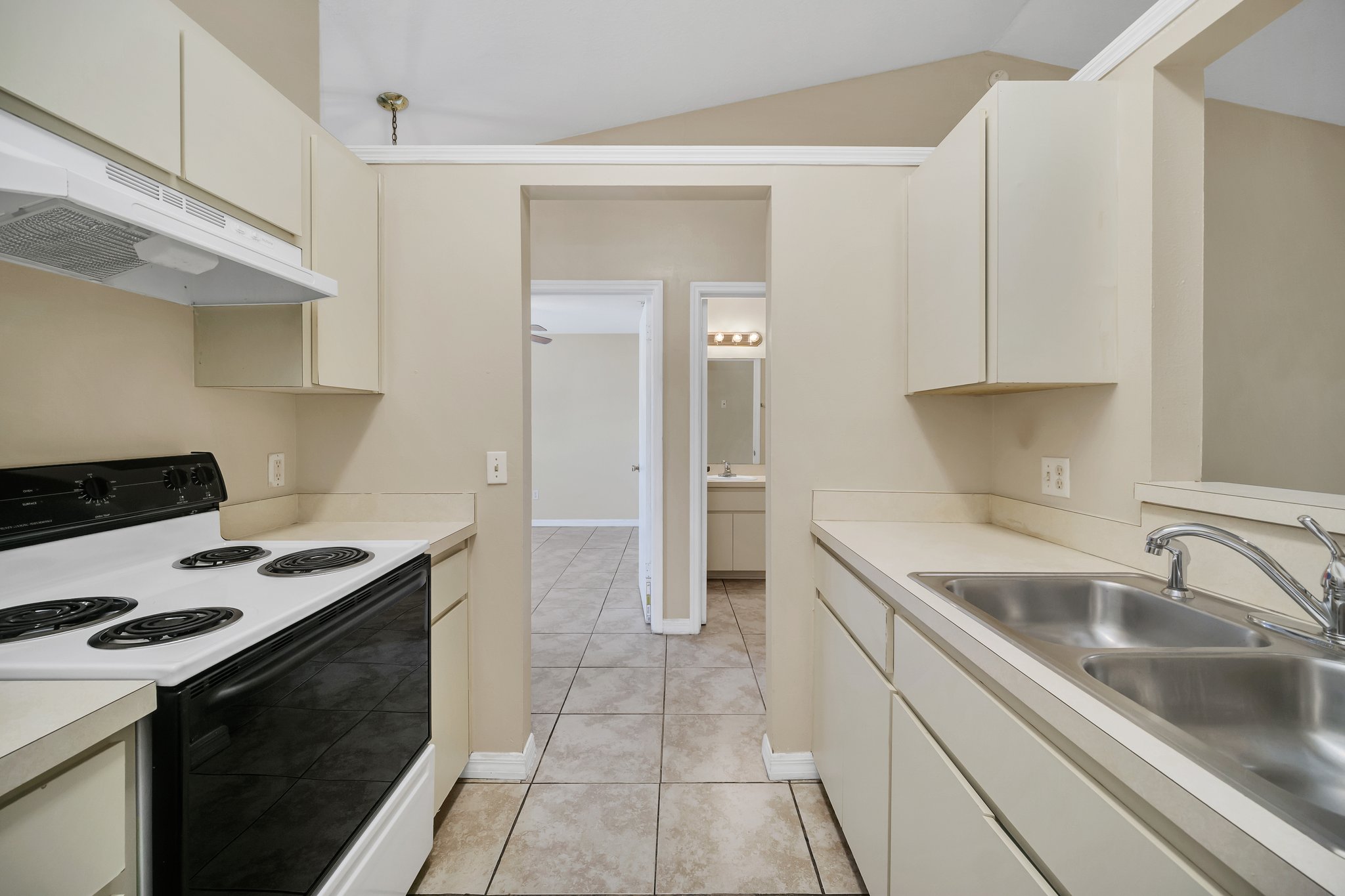Kitchen with stove and fridge